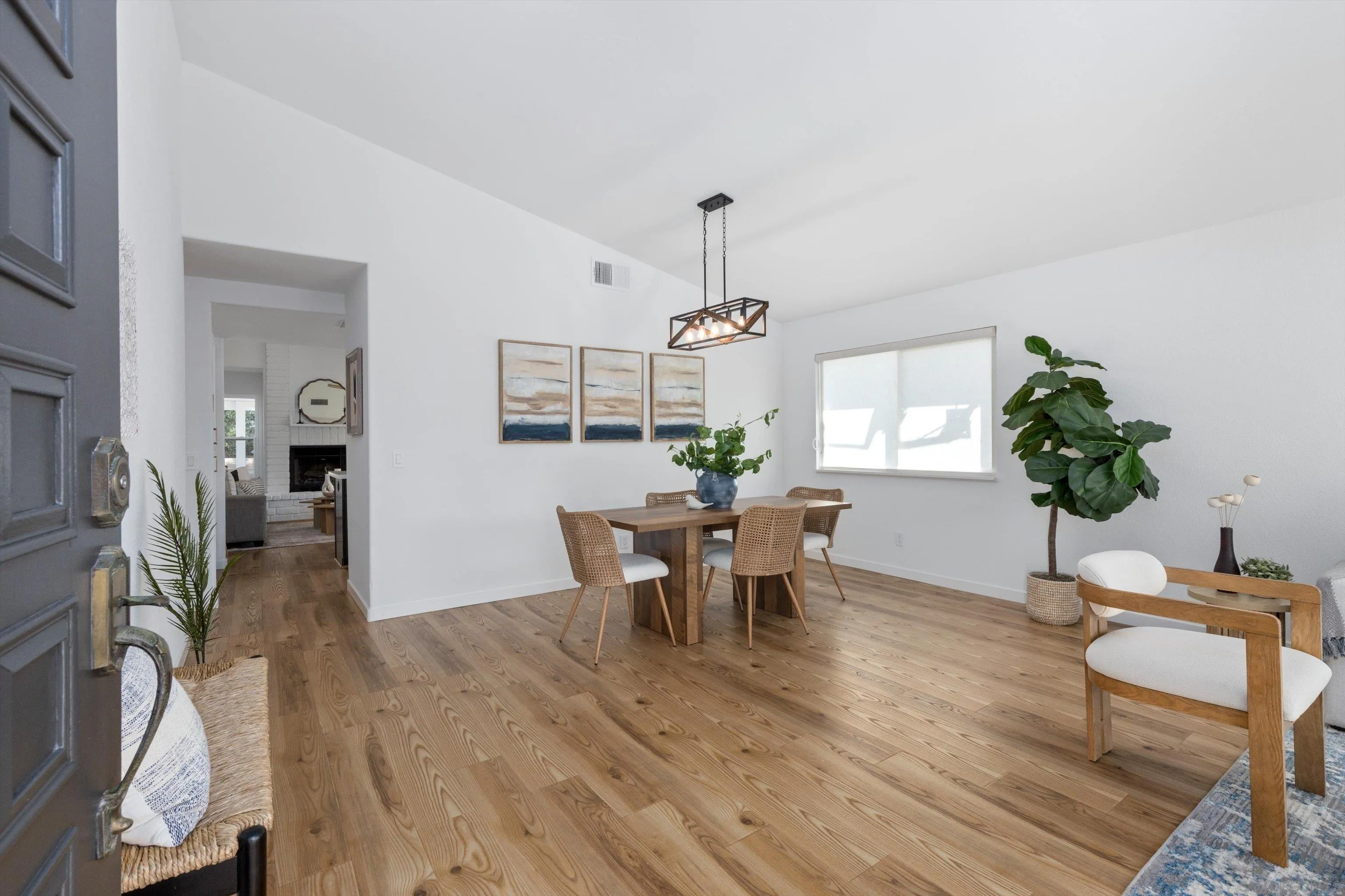 4640 Waverly Road Oceanside, CA 92056 - Photo 7 of 49 a view of a dining room with furniture and wooden floor