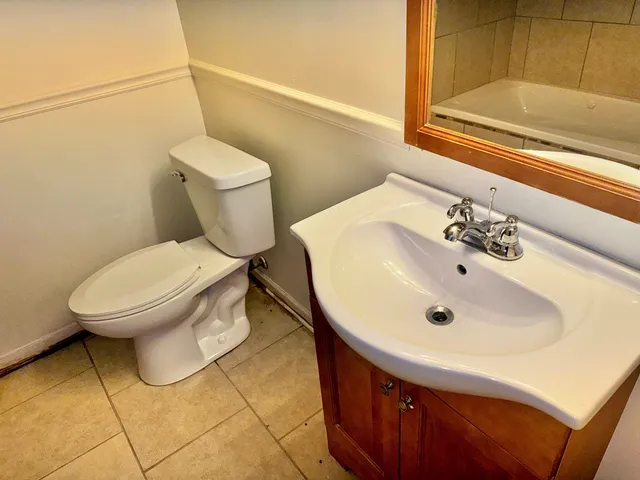 a bathroom with a sink and a toilet