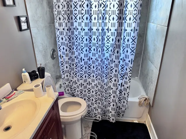 a bathroom with a sink and toilet