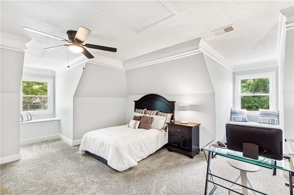 3584 Archgate Court Alpharetta, GA 30004 - Photo 1 of 1 a bedroom with a bed and a window