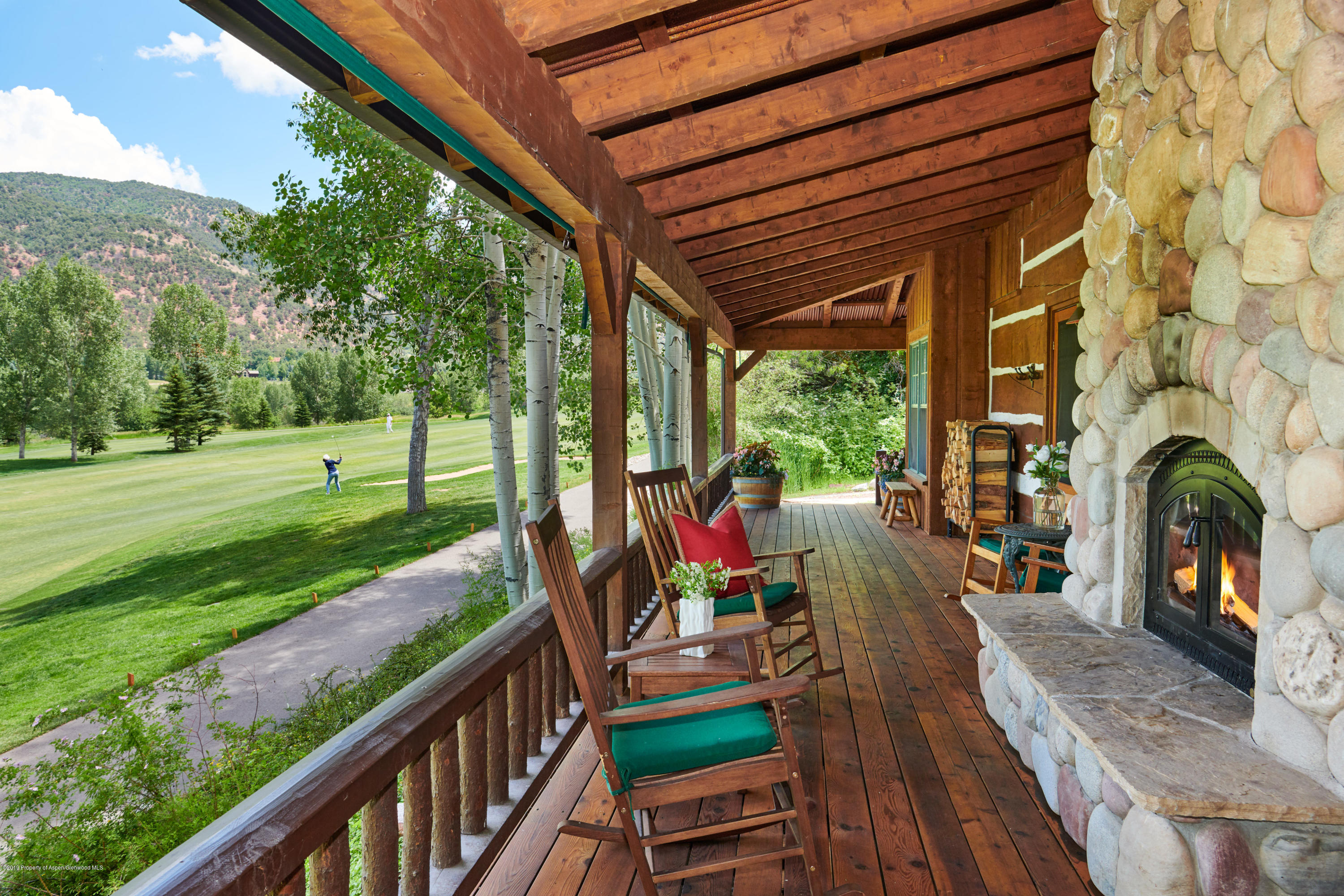 38 Altamira Ranch Road Basalt, CO 81621 - Photo 15 of 16 a view of a porch with furniture and garden
