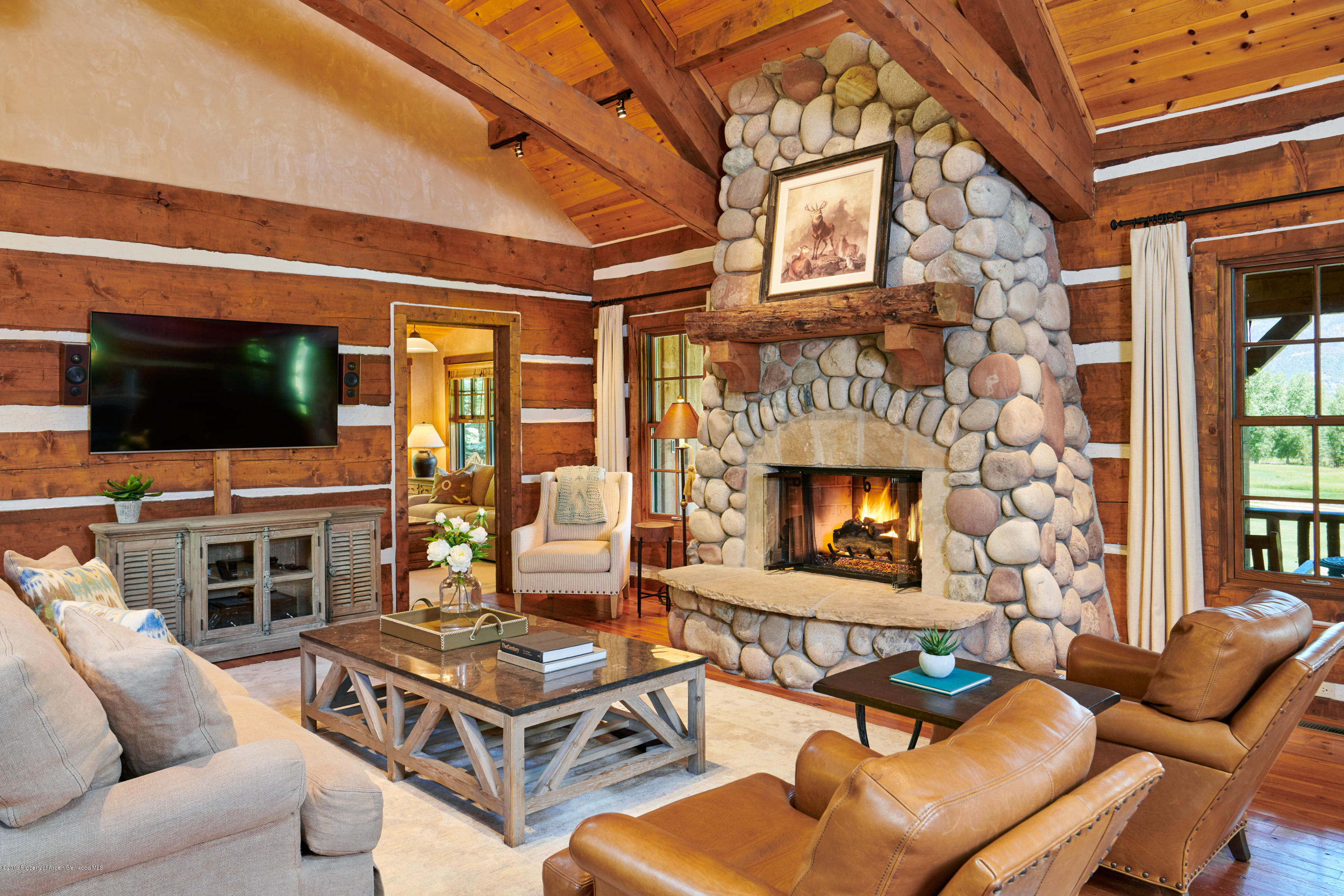 38 Altamira Ranch Road Basalt, CO 81621 - Photo 3 of 16 a building outdoor space with patio furniture