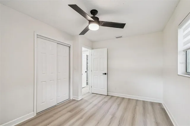 a view of a bathroom with a sink toilet and vanity