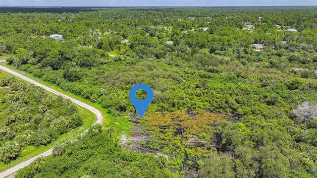 a view of a yard with an outdoor space
