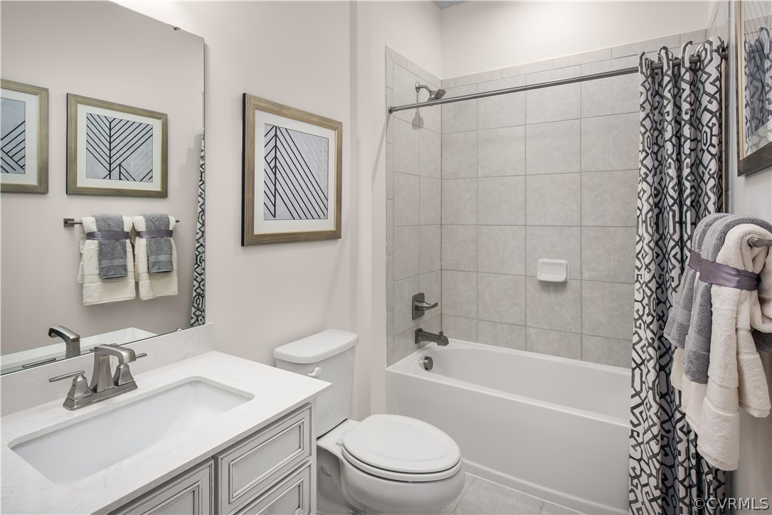 14112 Millpointe Road, Unit 4C Midlothian, VA 23114 - Photo 12 of 18 a bathroom with a sink a toilet and a bathtub