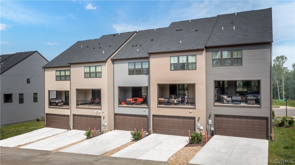 14112 Millpointe Road, Unit 4C Midlothian, VA 23114 - Photo 2 of 18 a front view of a house with glass windows and door