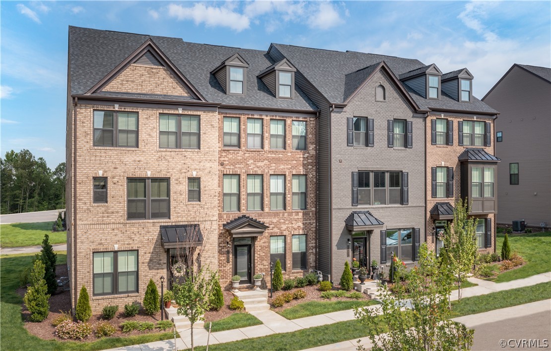 14112 Millpointe Road, Unit 4C Midlothian, VA 23114 - Photo 3 of 18 front view of a house with a yard