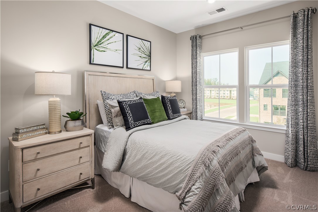 14112 Millpointe Road, Unit 4C Midlothian, VA 23114 - Photo 10 of 18 a bedroom with a bed and a window