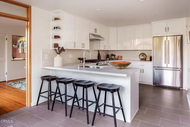 a room with cabinets and a window