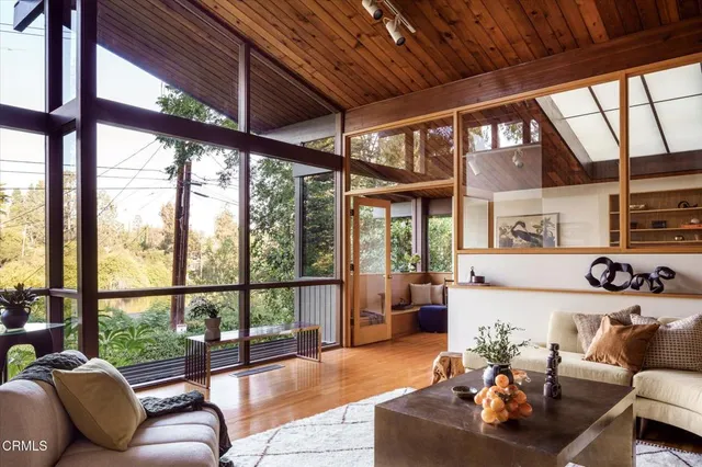 a view of a cafe with sitting area