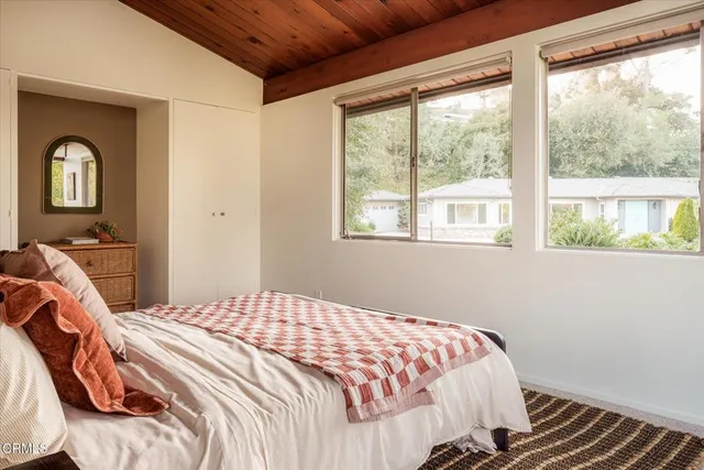 a room with furniture and a book shelf