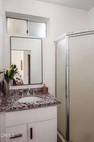 a outdoor space with lots of tables a garden and chairs