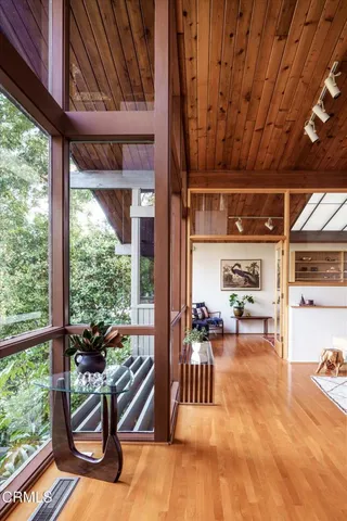 a room with furniture and a large window