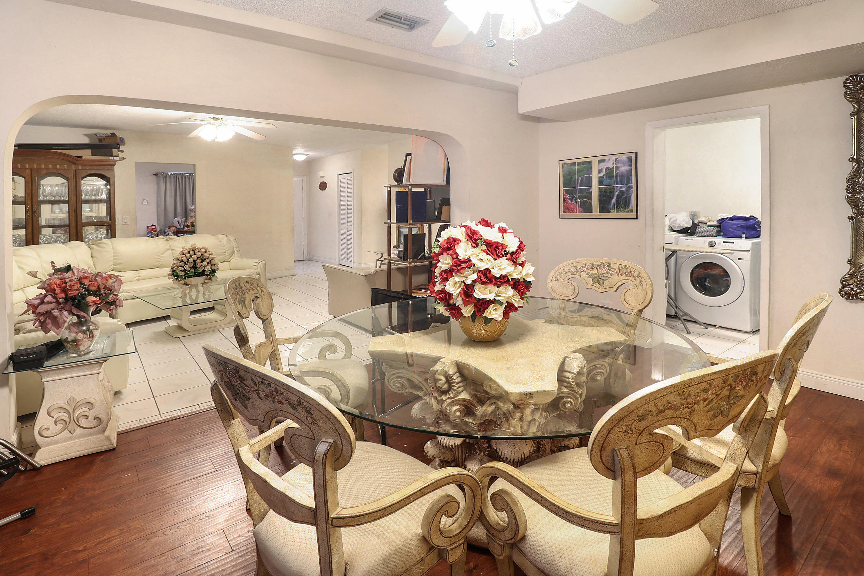 4710 Northwest 11th Place Lauderhill, FL 33313 - Photo 4 of 12 a dining room with furniture and view of kitchen