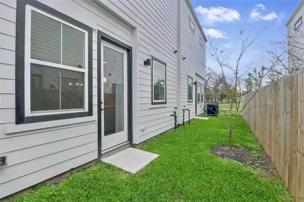 a view of a back yard of the house