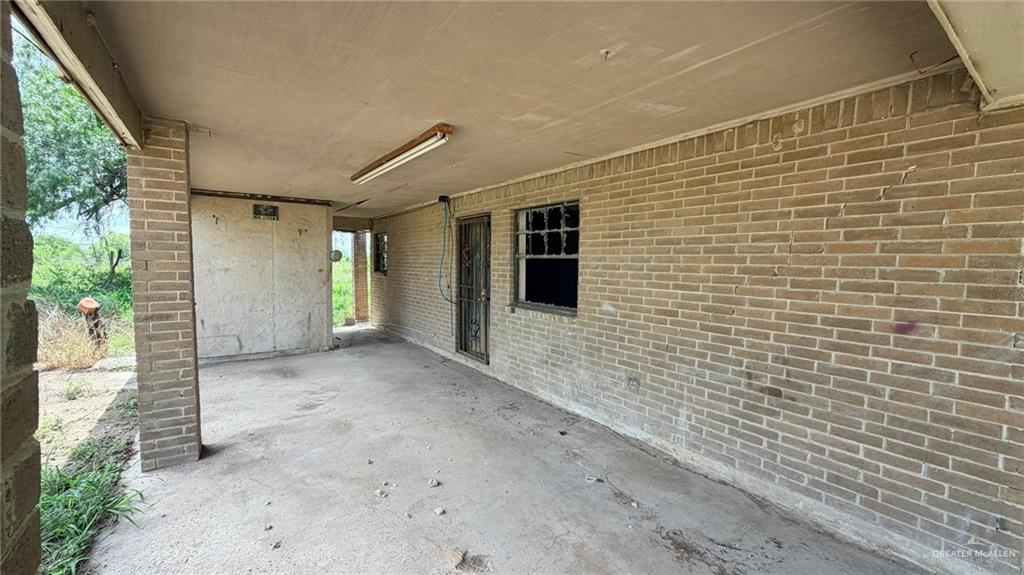 1524 West Hi Line Road Pharr, TX 78577 - Photo 31 of 34 a view of a brick house with an outdoor space