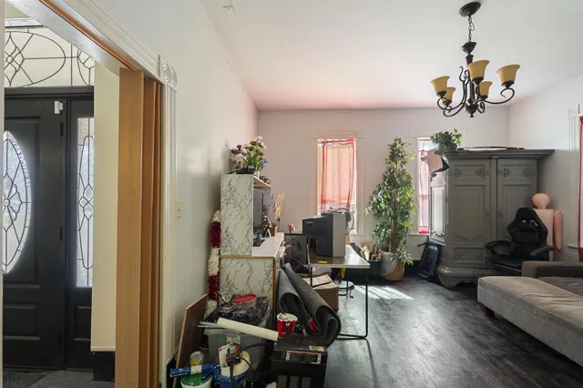 a kitchen with stainless steel appliances granite countertop a stove and a refrigerator