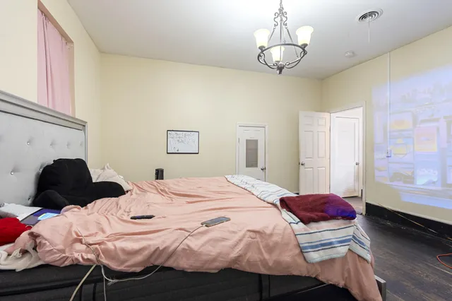 an aerial view of residential building with parking space