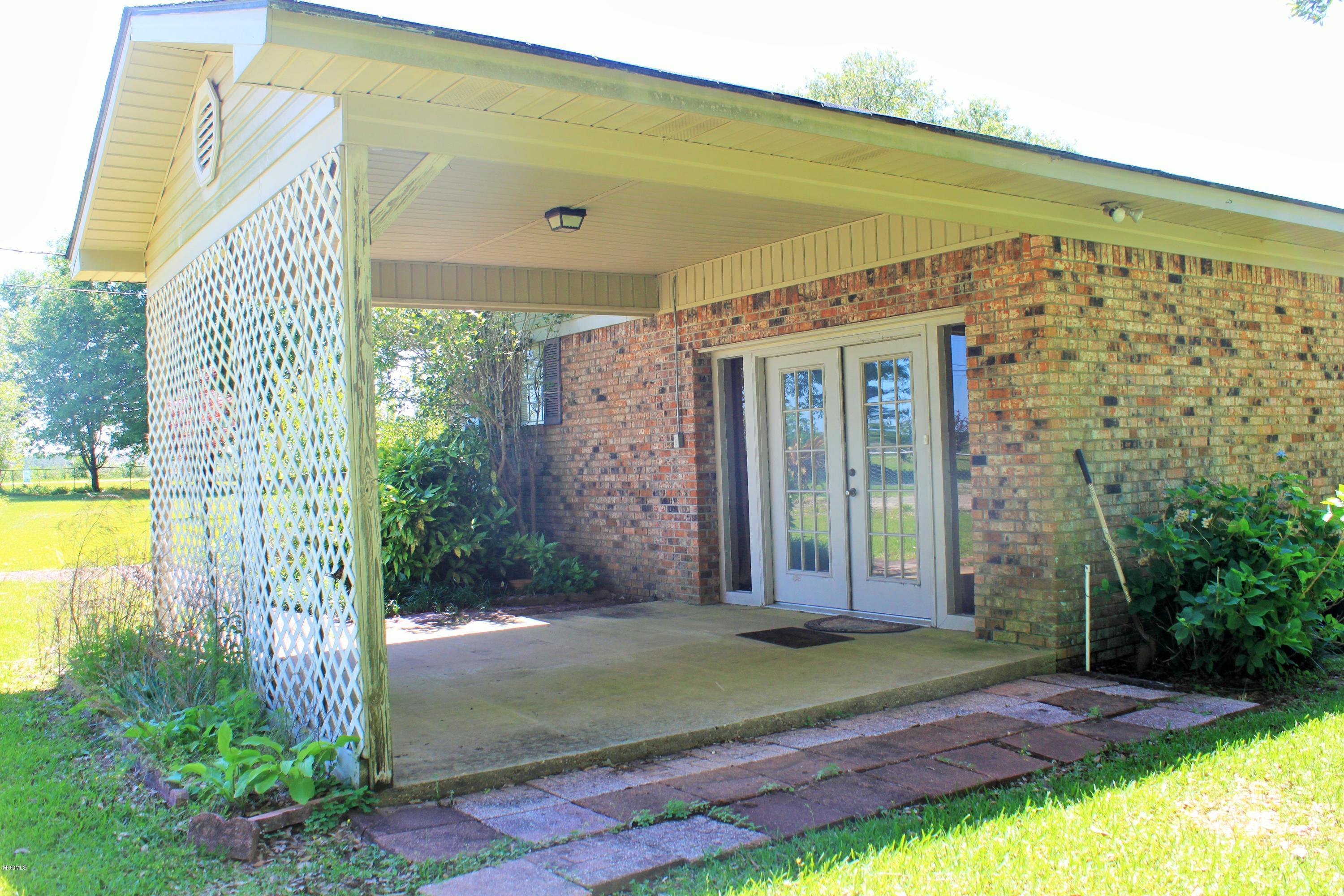 1057 Route 5 Road Lucedale, MS 39452 - Photo 29 of 34 Side porch entrance