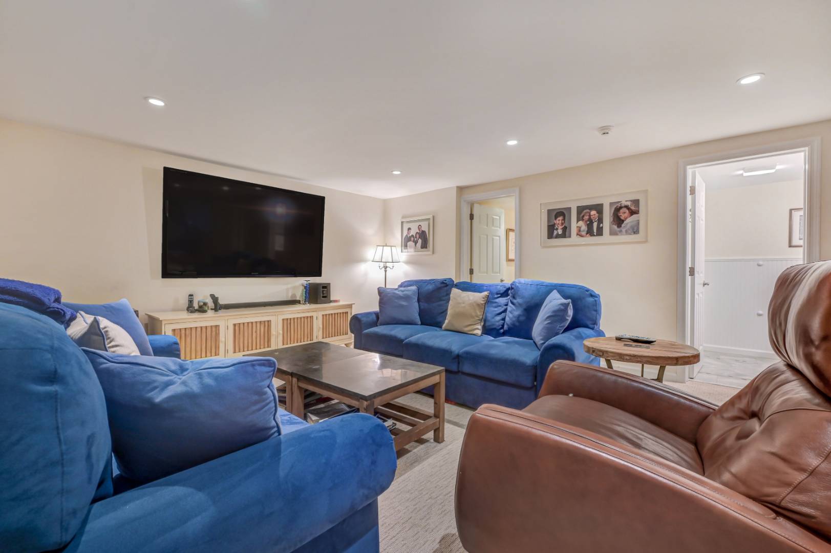 60 South Road Westhampton Beach, NY 11978 - Photo 20 of 45 a living room with furniture and a flat screen tv
