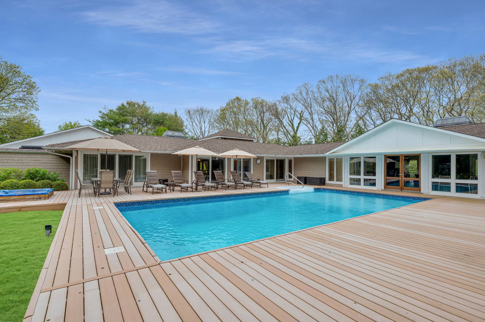 60 South Road Westhampton Beach, NY 11978 - Photo 32 of 45 a front view of house with yard and green space