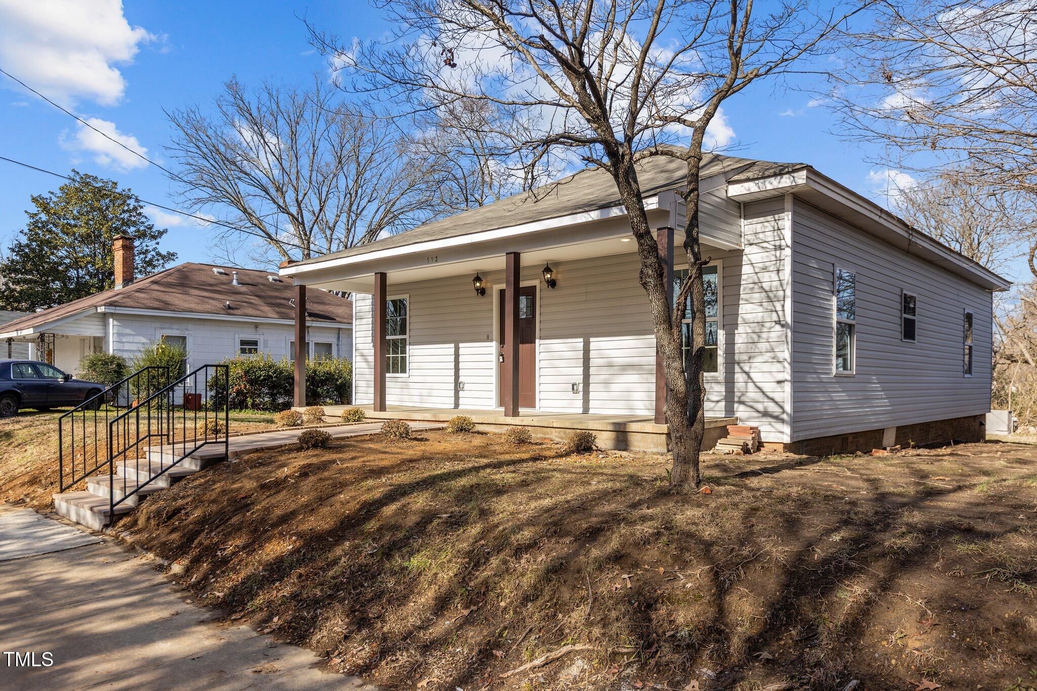 112 Edgewood Drive Roxboro, NC 27573 - Photo 2 of 37 a view of a house with a yard