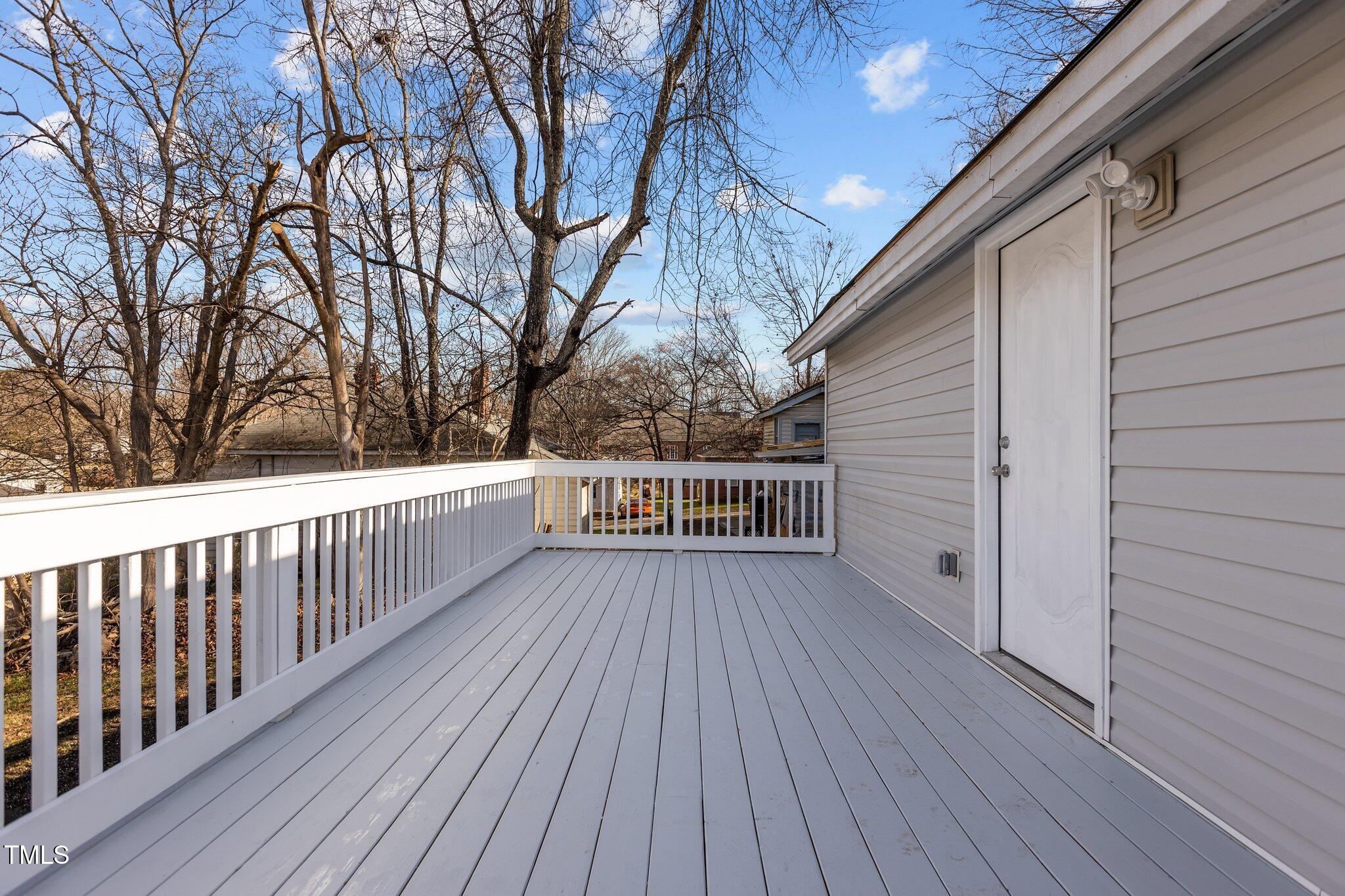 112 Edgewood Drive Roxboro, NC 27573 - Photo 29 of 37 a view of deck with wooden floor and fence