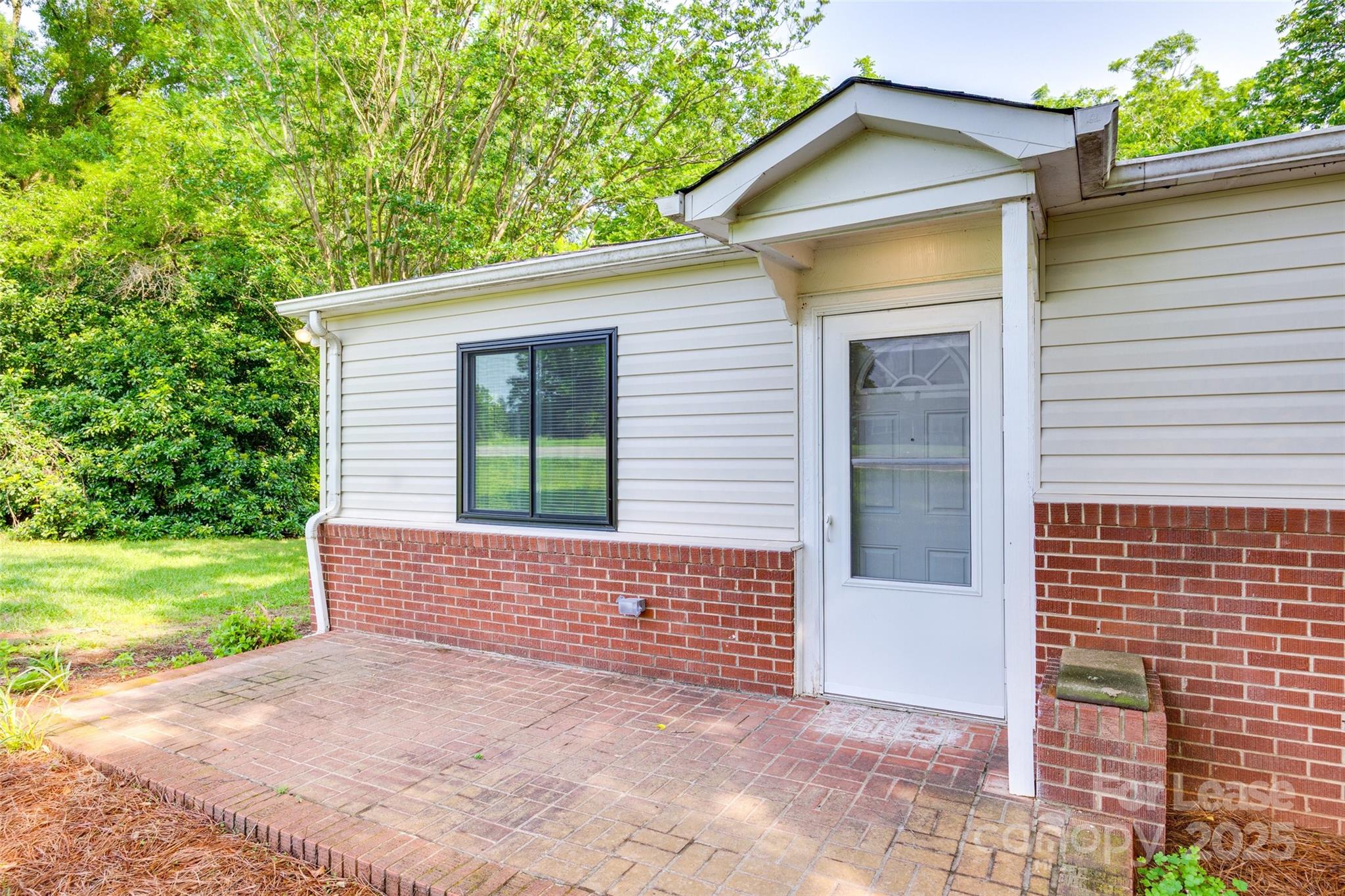 3113 E Highway, Unit 218 Monroe, NC 28110 - Photo 2 of 27 a view of front of house with a yard