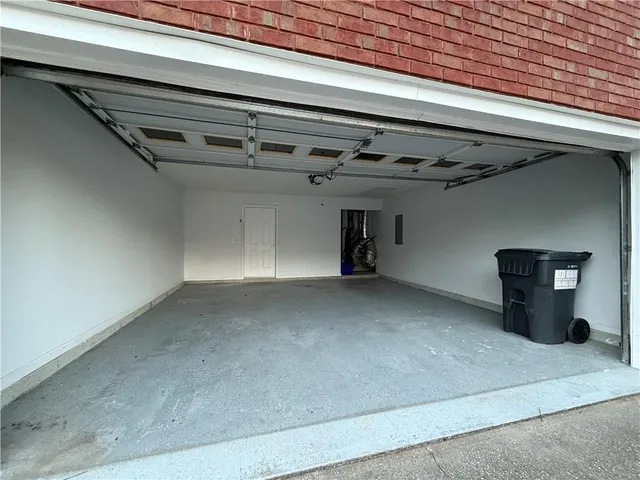 a view of a room with wooden walls