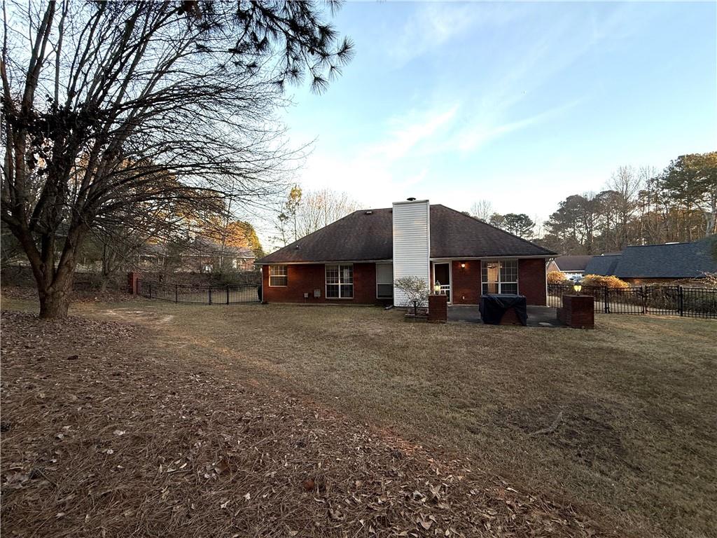 3284 Saddlegate Court Buford, GA 30519 - Photo 18 of 22 a car parked in front of a house