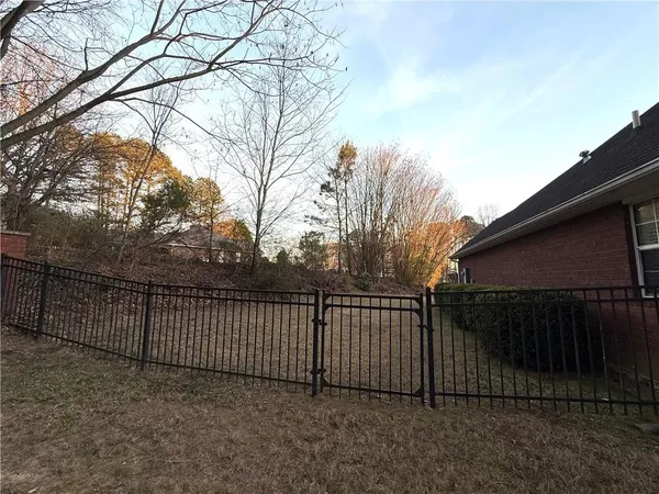 a view of a wooden fence
