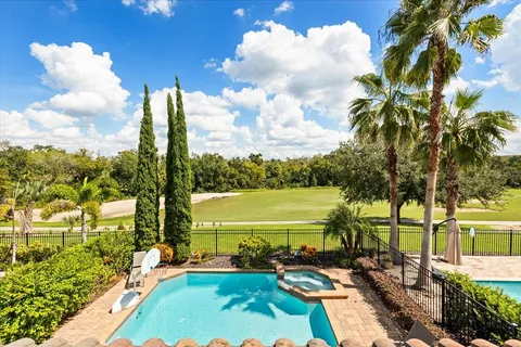an aerial view of a house with a garden
