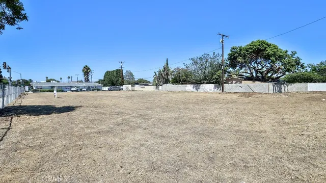 a view of a road with a building in the background