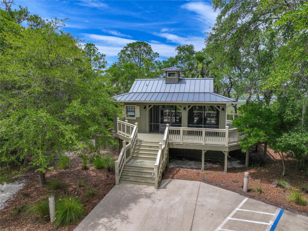 96198 Brady Point Road Fernandina Beach, FL 32034 - Photo 15 of 18 a view of house with yard and entertaining space