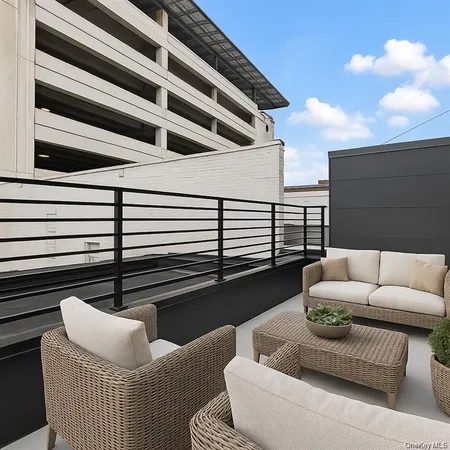 a roof deck with couch
