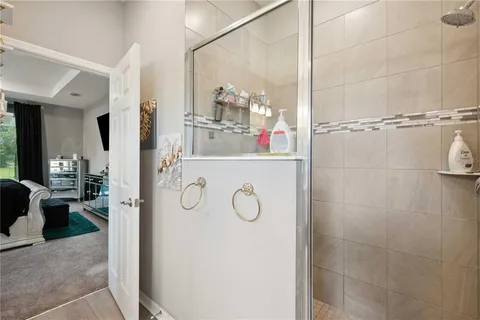 a bathroom with a sink vanity and a mirror
