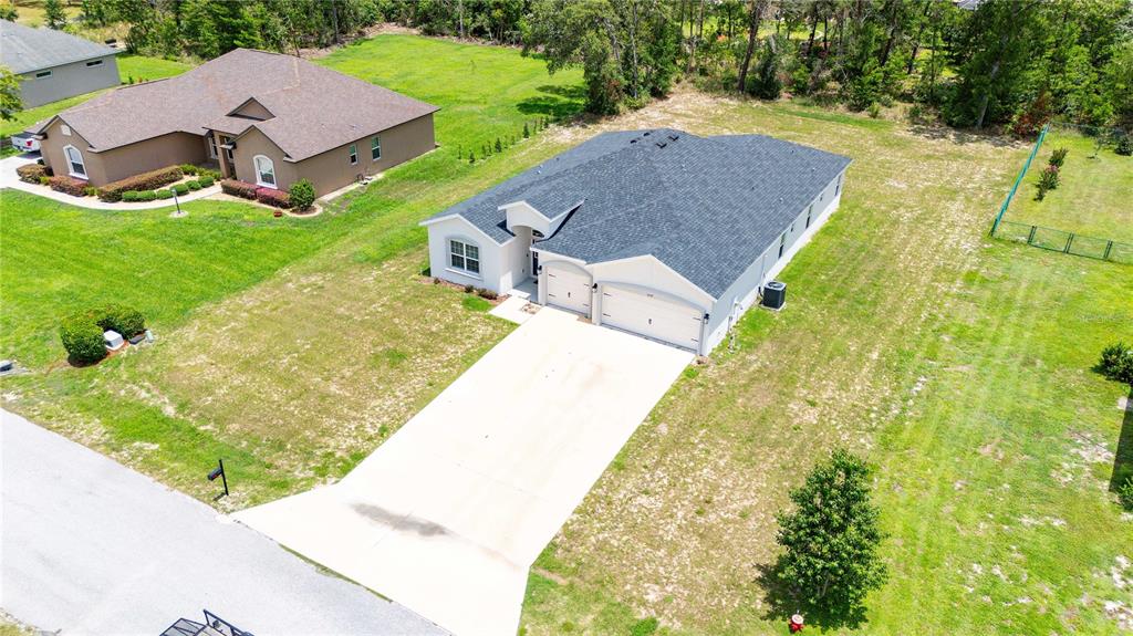 5239 Southwest 114th Street Road Ocala, FL 34476 - Photo 38 of 42 an aerial view of a house