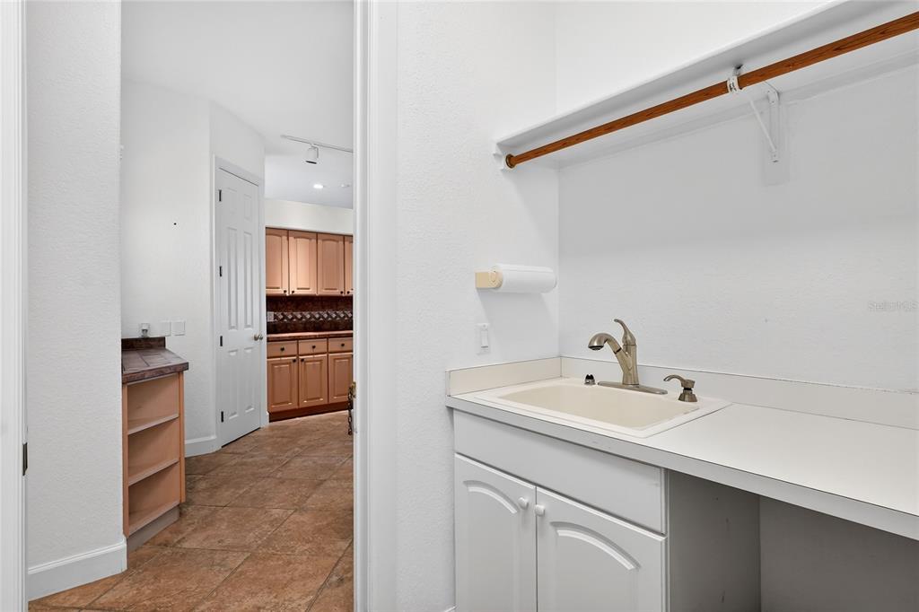 2968 Plantation Road Winter Haven, FL 33884 - Photo 24 of 81 a bathroom with a sink and a mirror