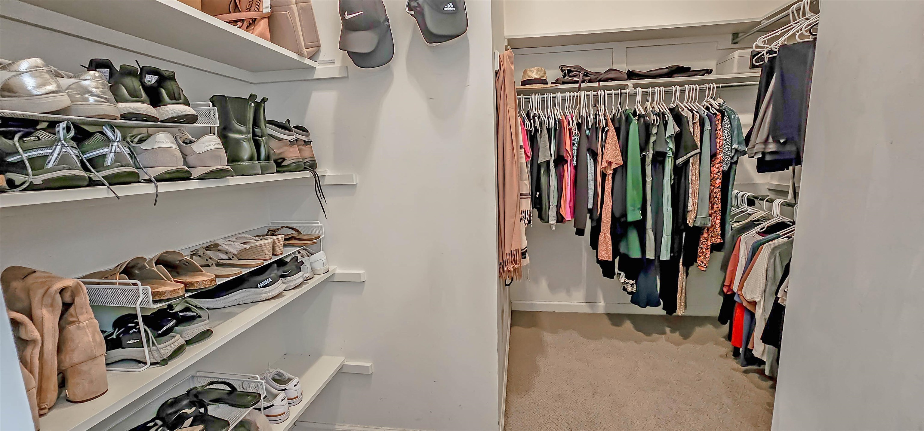 1784 Penshurst Drive Collierville, TN 38017 - Photo 24 of 40 a view of walk in closet with clothes and shoes
