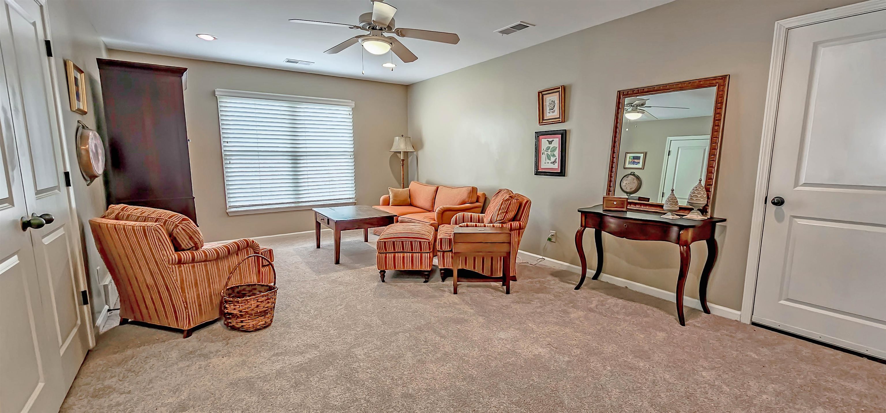 1784 Penshurst Drive Collierville, TN 38017 - Photo 25 of 40 a living room with furniture and a window