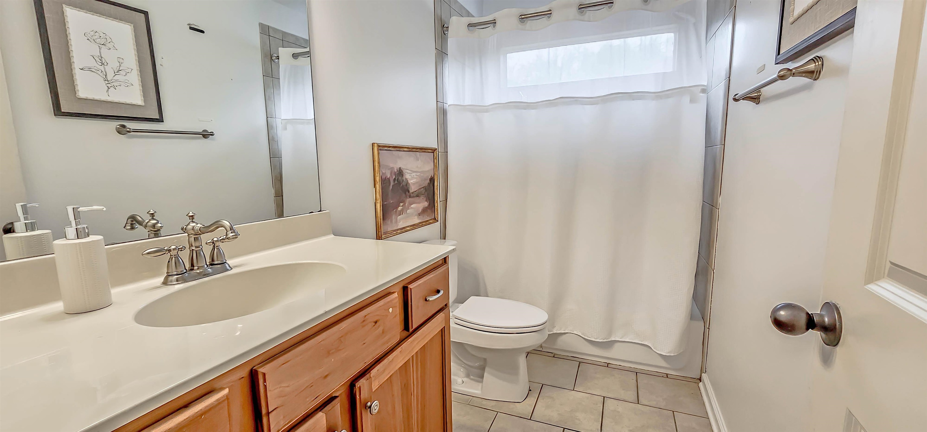 1784 Penshurst Drive Collierville, TN 38017 - Photo 31 of 40 a bathroom with a sink toilet and shower