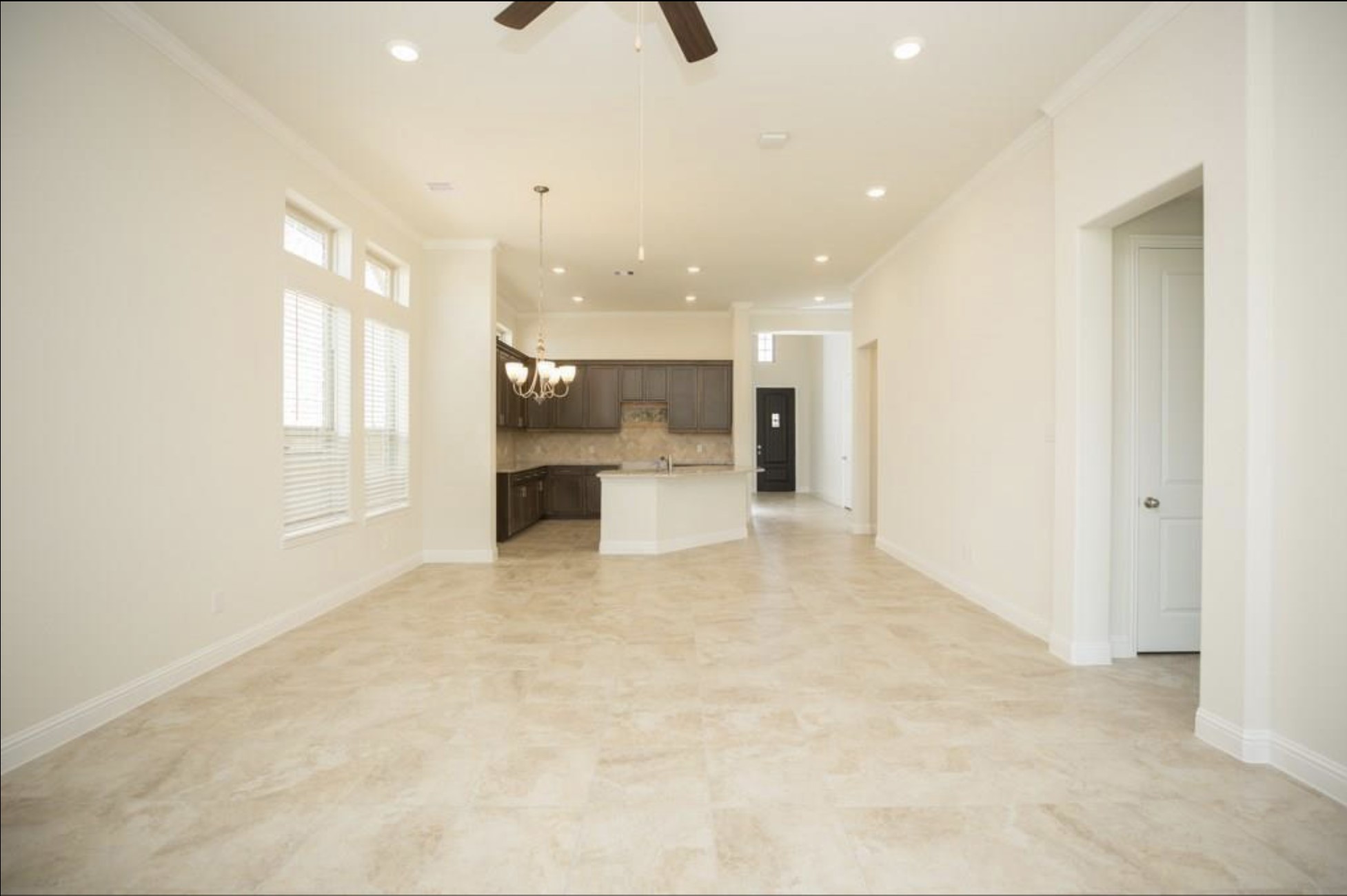 7438 Bethpage Lane Spring, TX 77389 - Photo 7 of 16 a view of a kitchen with a refrigerator and a window