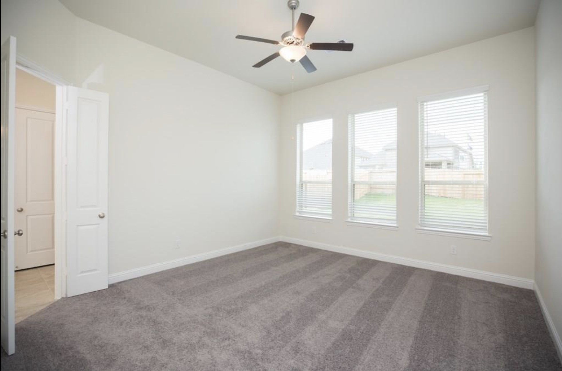7438 Bethpage Lane Spring, TX 77389 - Photo 9 of 16 a view of an empty room with a window