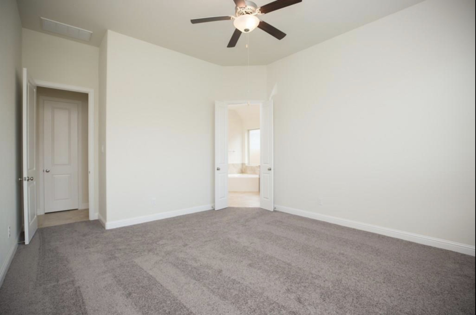 7438 Bethpage Lane Spring, TX 77389 - Photo 10 of 16 a view of an empty room and chandelier fan
