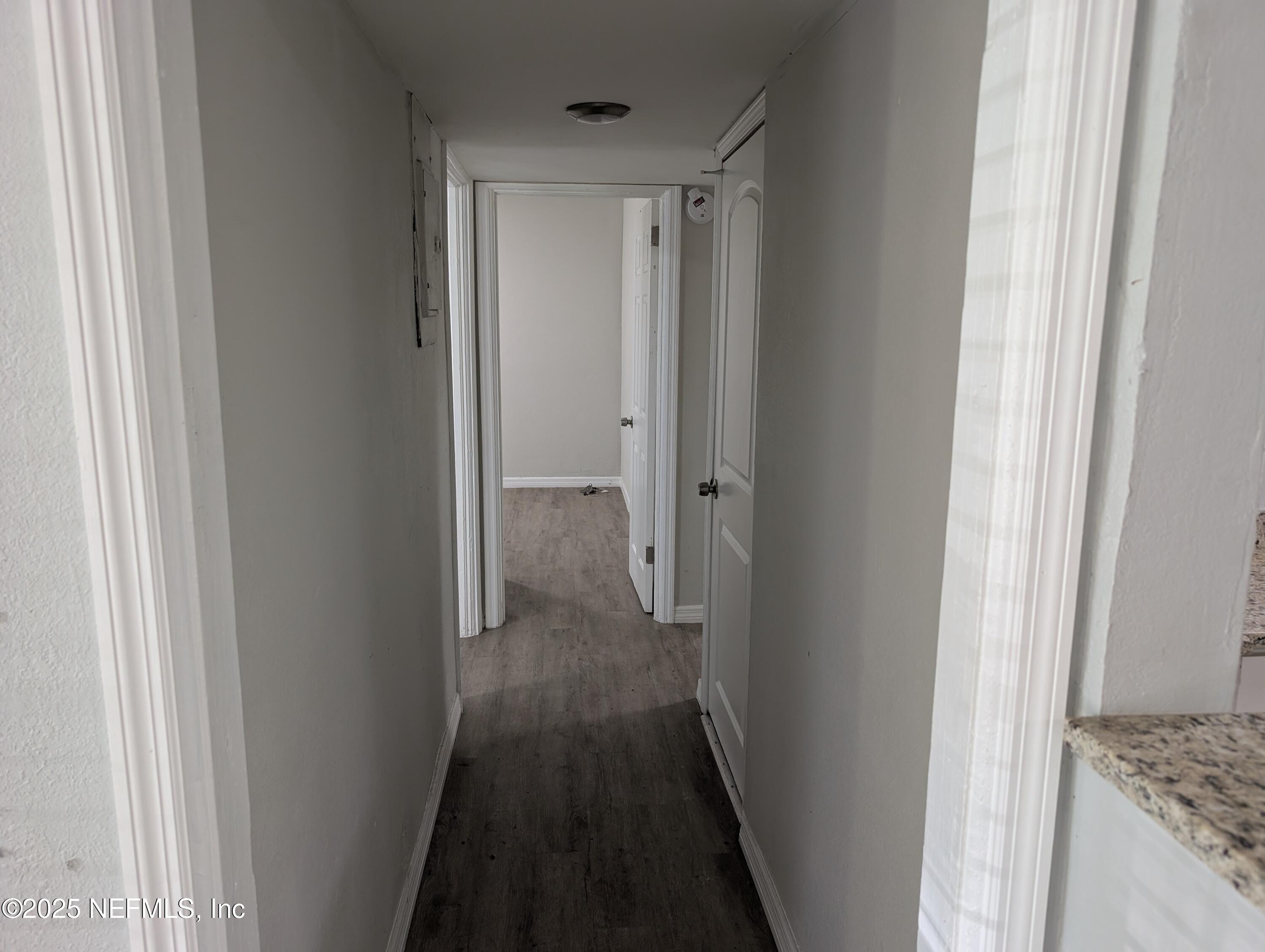 1339 Ellis Road South Jacksonville, FL 32205 - Photo 12 of 26 a view of a bathroom from the hallway