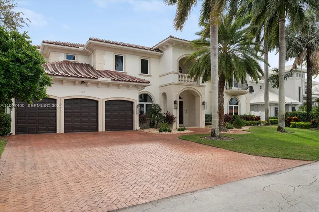front view of a house with a garden