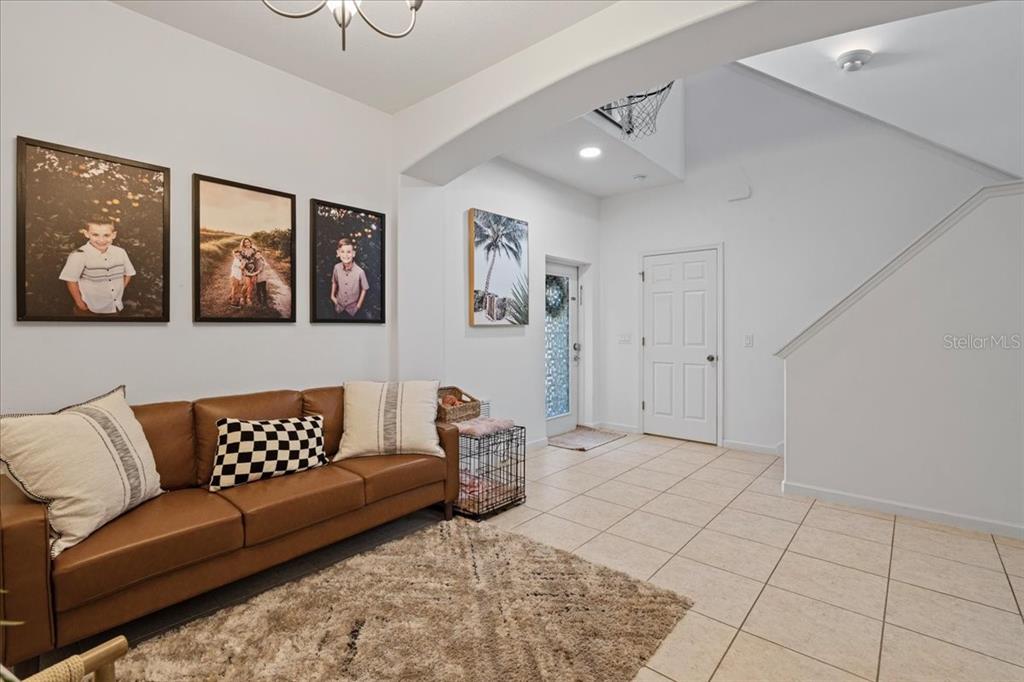 3271 Titanic Circle, Unit 39 Indialantic, FL 32903 - Photo 10 of 60 a view of a livingroom with a couch