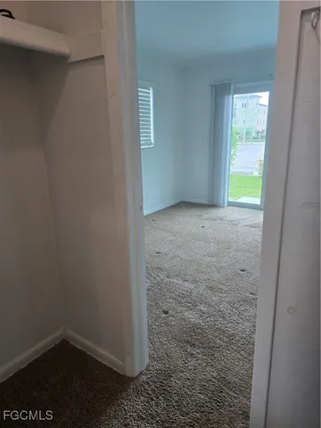 a view of an empty walk in closet