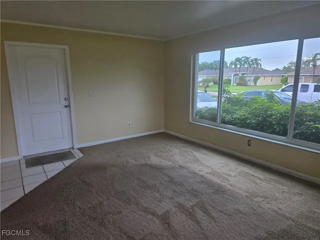 a kitchen with cabinets appliances and a sink