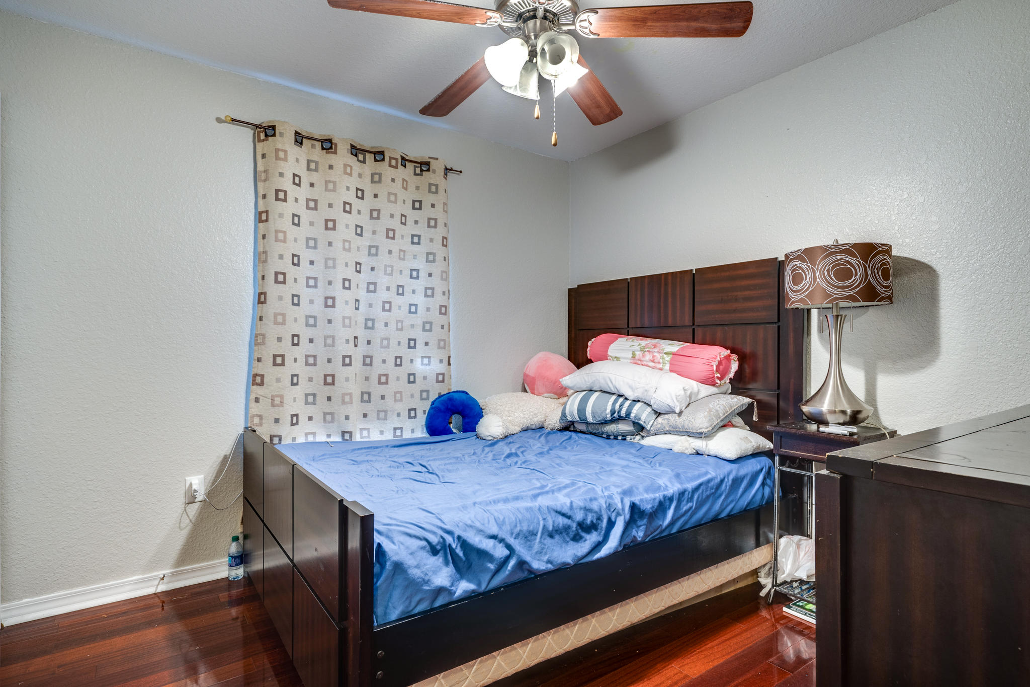 23 East Shipwreck Road Santa Rosa Beach, FL 32459 - Photo 12 of 21 a bedroom with a bed and a chandelier